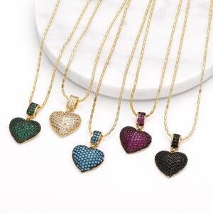 Gold and White Heart Pendant Necklace Collection
